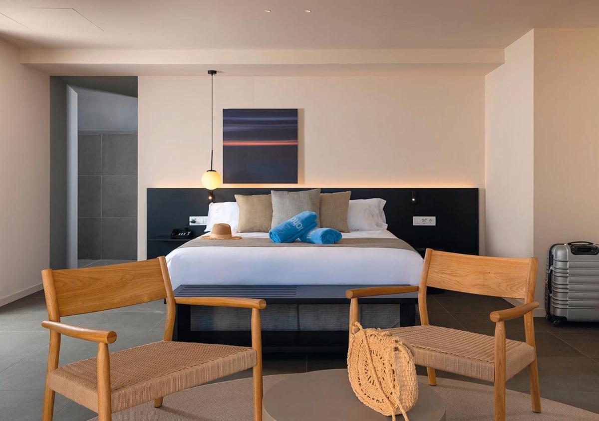Cama o camas de una habitación en AQUA Hotel Promenade & Spa 4Sup