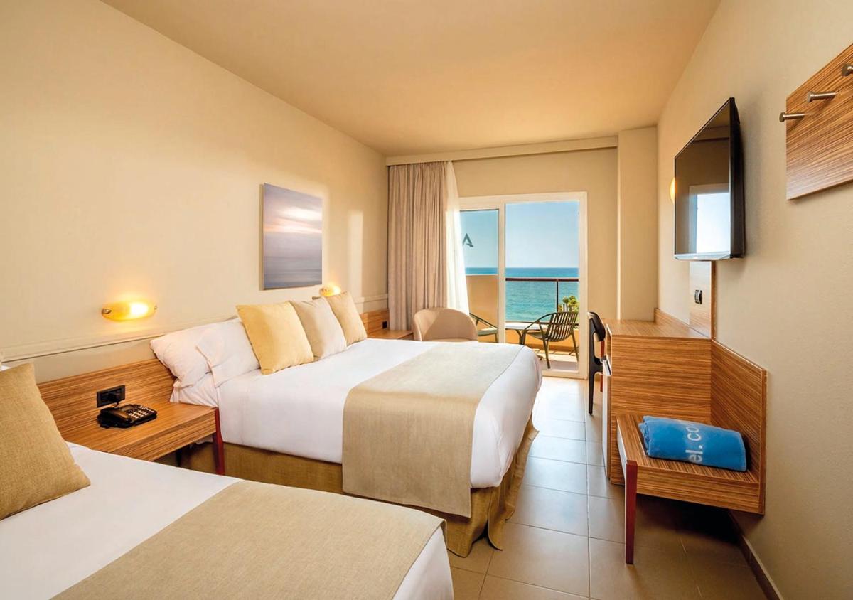 Cama o camas de una habitación en AQUA Hotel Promenade & Spa 4Sup