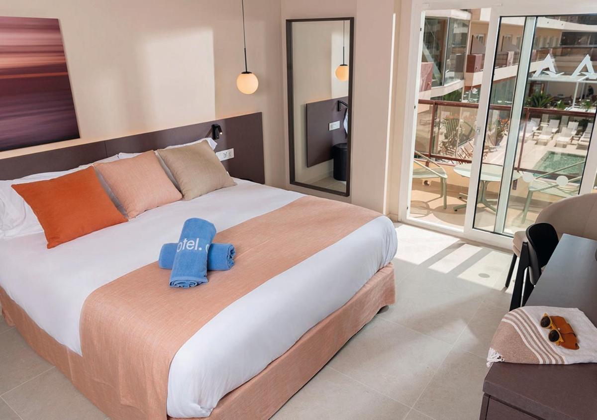 Cama o camas de una habitación en AQUA Hotel Promenade & Spa 4Sup