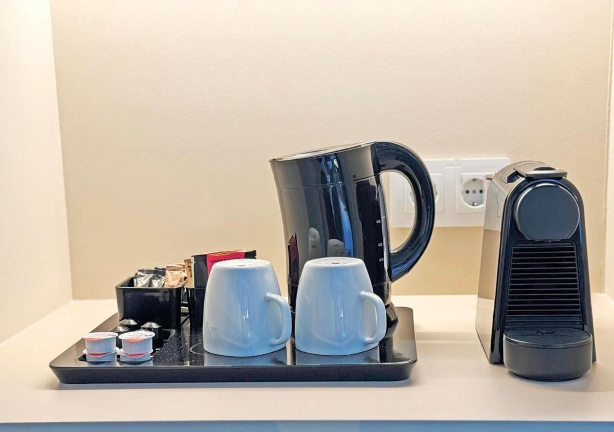 Utensilios para hacer té y café en AQUA Hotel Promenade & Spa 4Sup