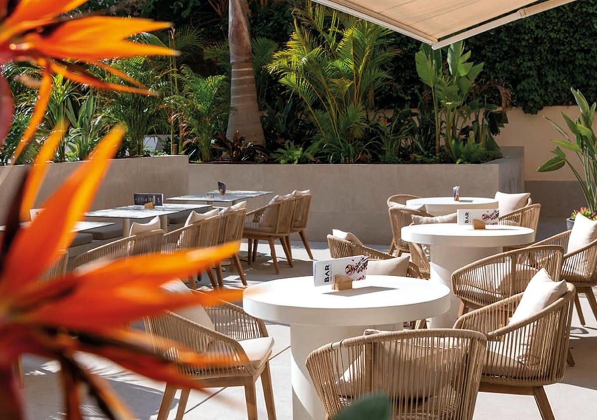 Un restaurante o sitio para comer en AQUA Hotel Promenade & Spa 4Sup