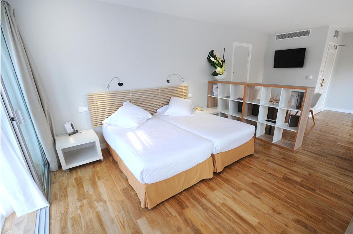 Un ou plusieurs lits dans un hébergement de l'établissement Splendid Hotel & Spa Nice