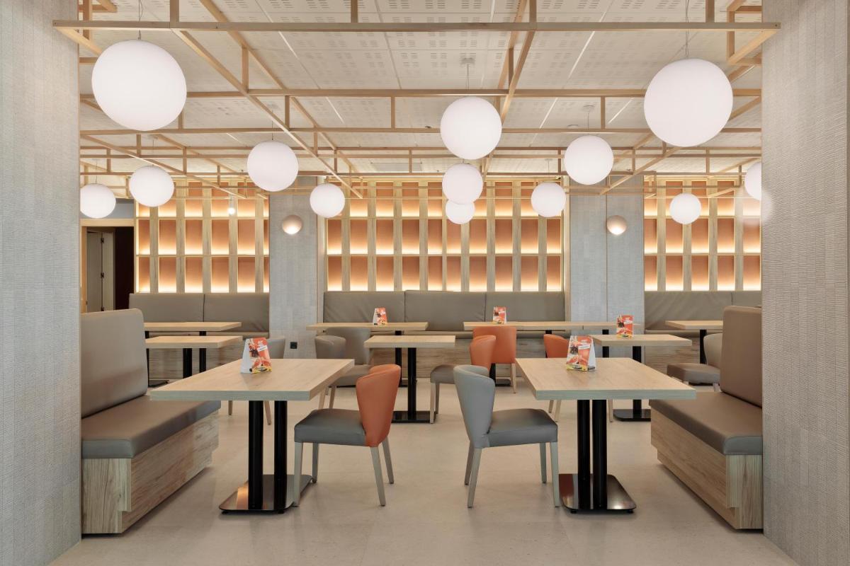 Zona de estar de Hotel Best Triton