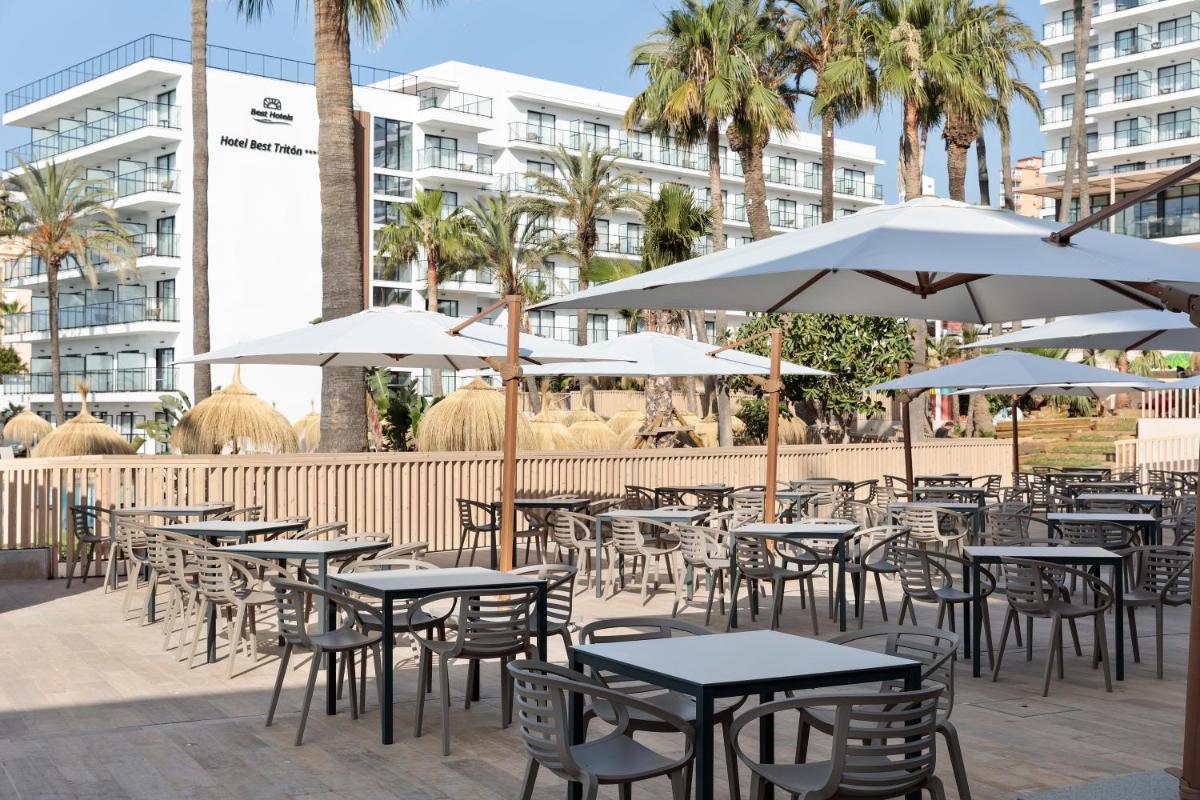 Un restaurante o sitio para comer en Hotel Best Triton