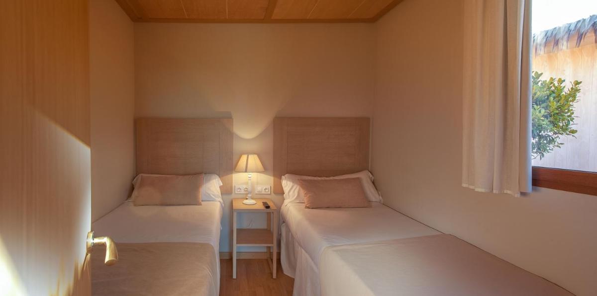 Cama o camas de una habitación en Magic Natura Resort