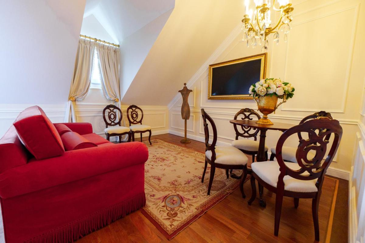Uma área de estar em Boutique Hotel Teatro