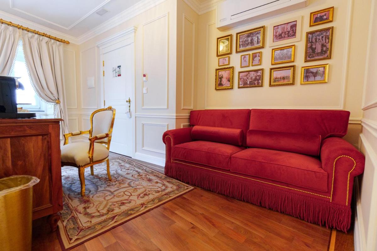 Uma área de estar em Boutique Hotel Teatro