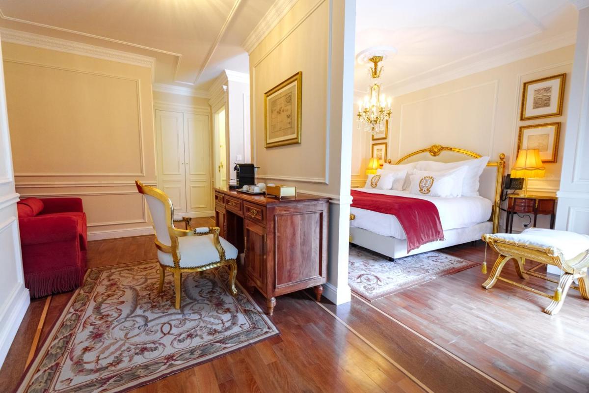 Uma cama ou camas num quarto em Boutique Hotel Teatro