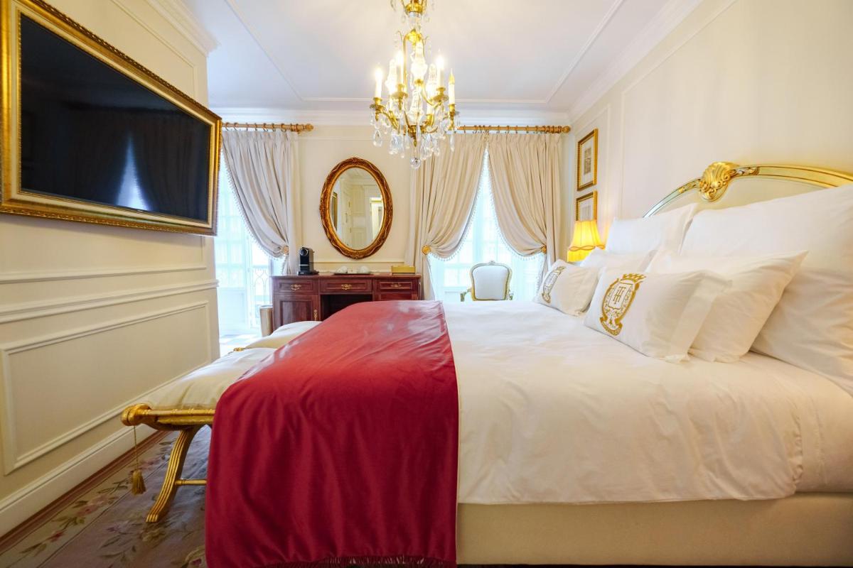 Uma cama ou camas num quarto em Boutique Hotel Teatro