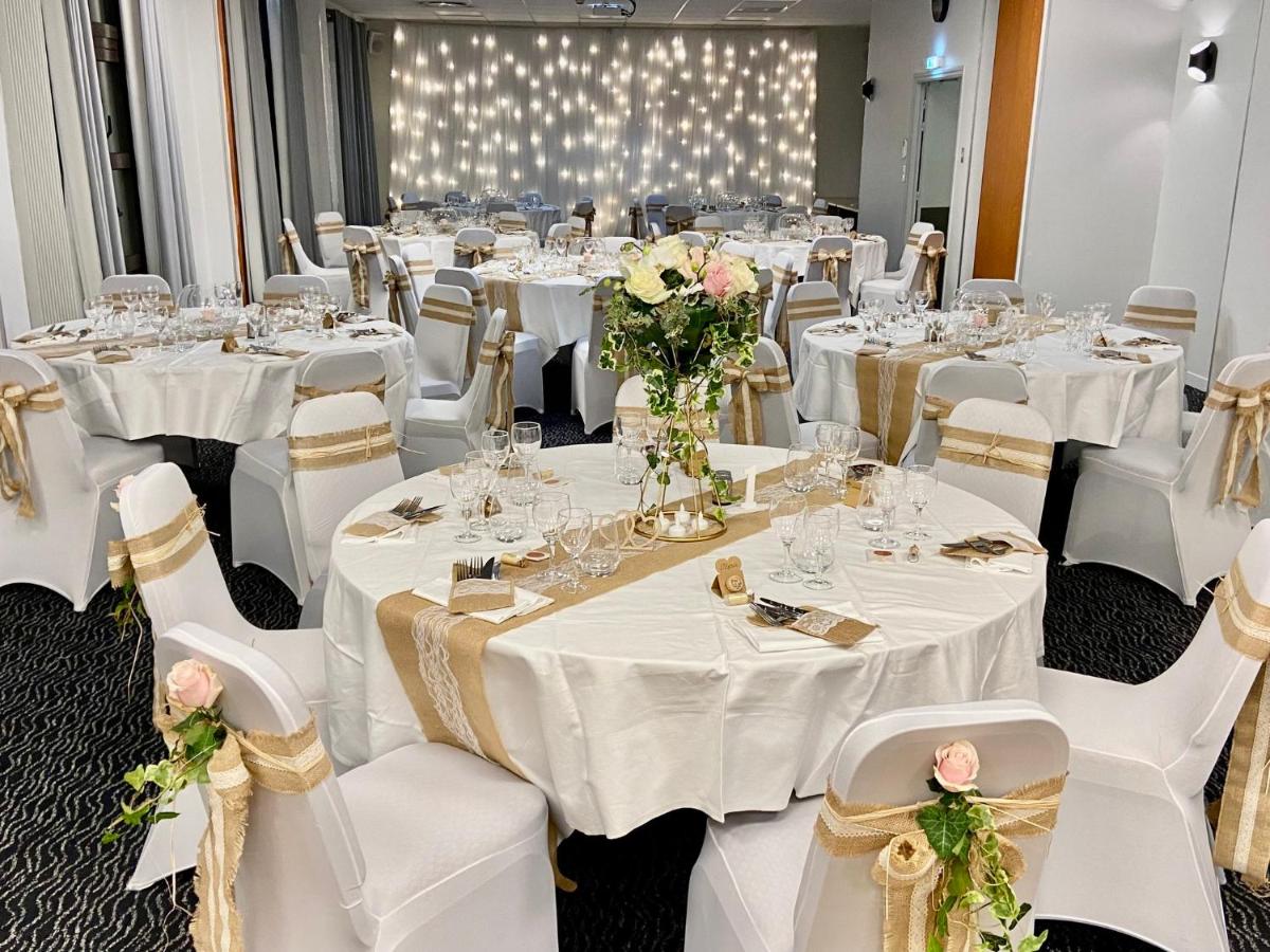 Restaurant ou autre lieu de restauration dans l'établissement Holiday Inn Calais Coquelles by IHG