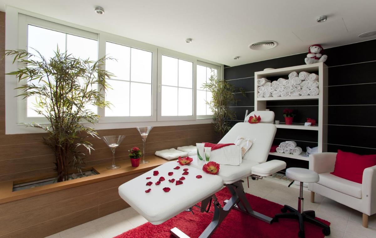 Zona de estar de Hotel Capricho