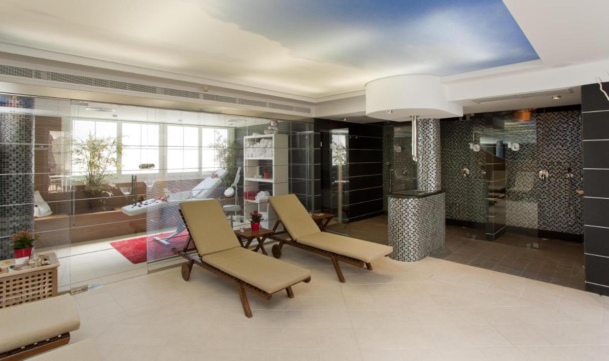 Zona de estar de Hotel Capricho