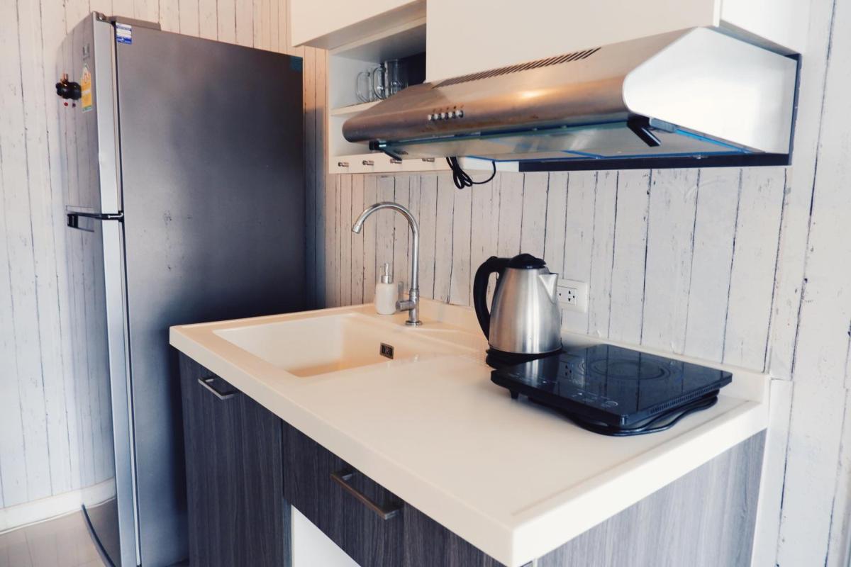 2 Beds 1 Sofa 5 Guests Condo with Washing Machine, Max Speed WiFi, Capsule Coffee Machine and Pool - Housity