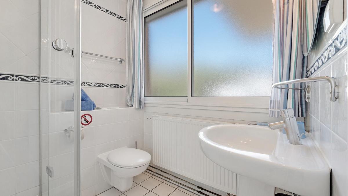 Salle de bains dans l'établissement Résidence les Tourelles