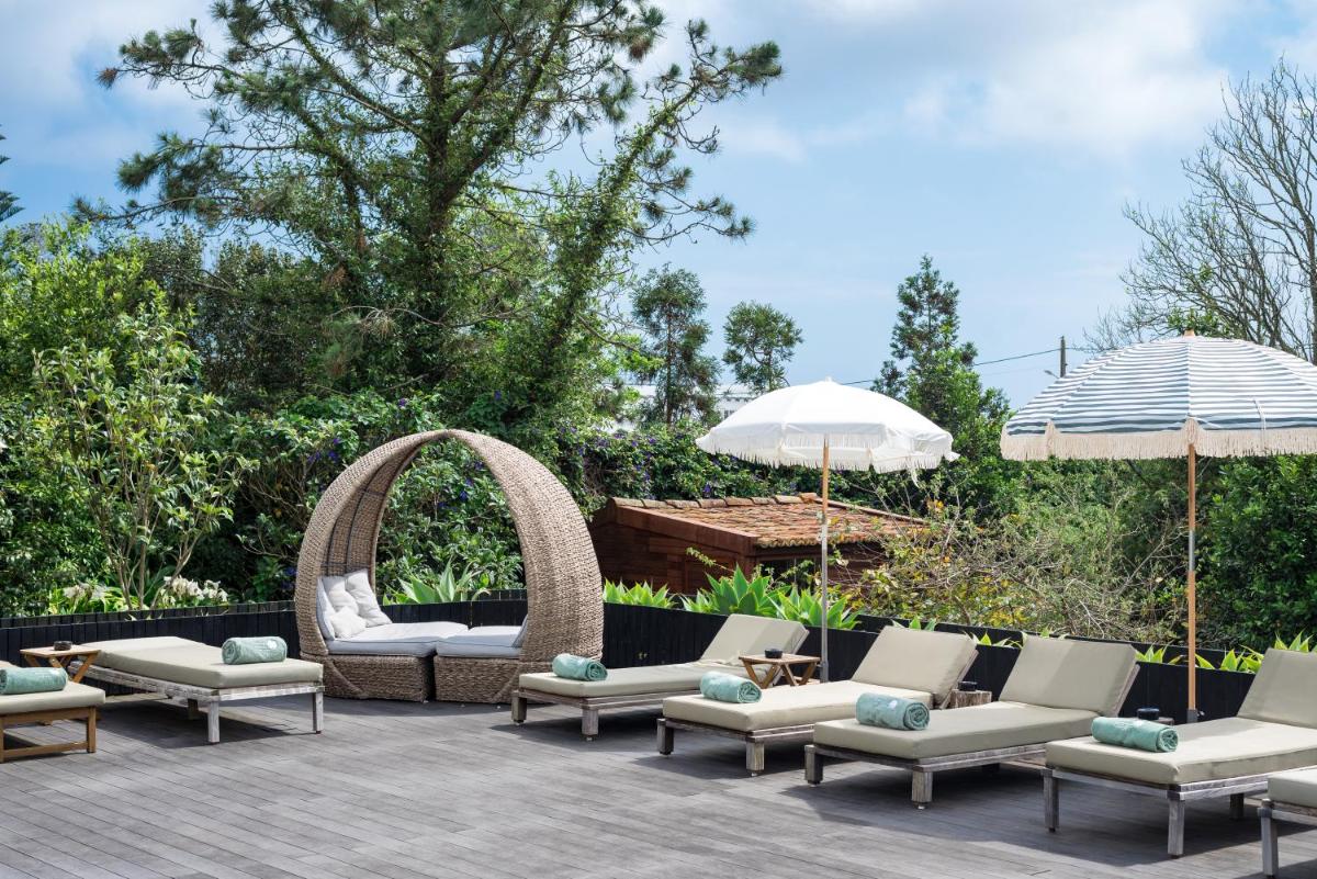 Um jardim no exterior de Senhora da Rosa, Tradition & Nature Hotel