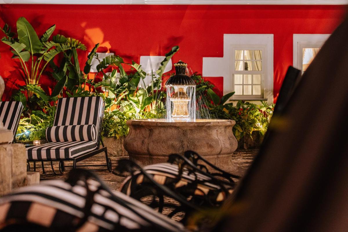 Uma área de estar em Boutique Hotel Teatro