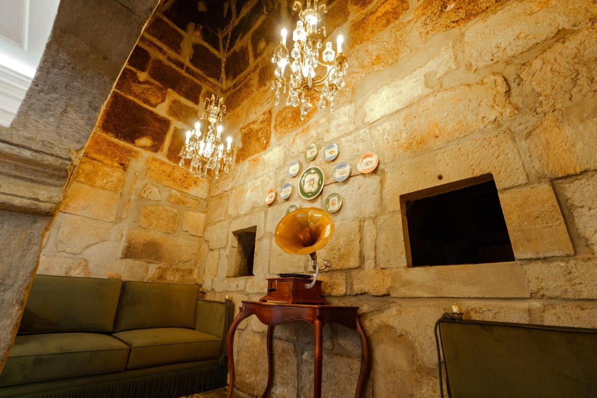 Uma área de estar em Boutique Hotel Teatro