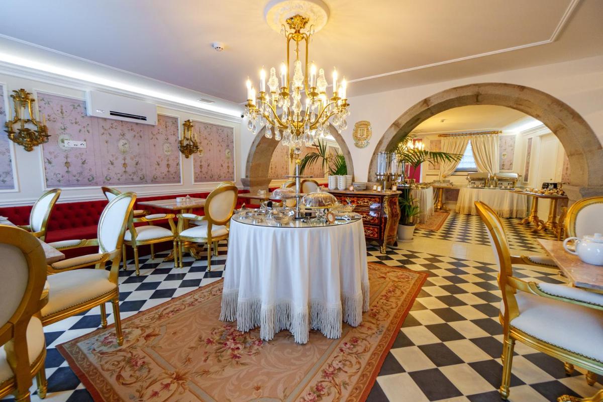 Uma área de estar em Boutique Hotel Teatro