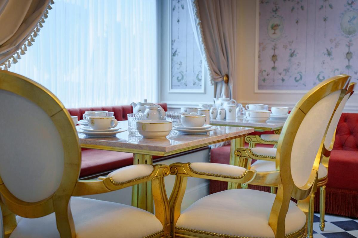 Uma área de estar em Boutique Hotel Teatro