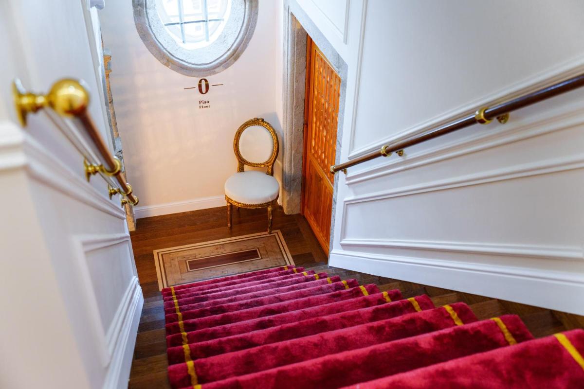 Uma cama ou camas num quarto em Boutique Hotel Teatro
