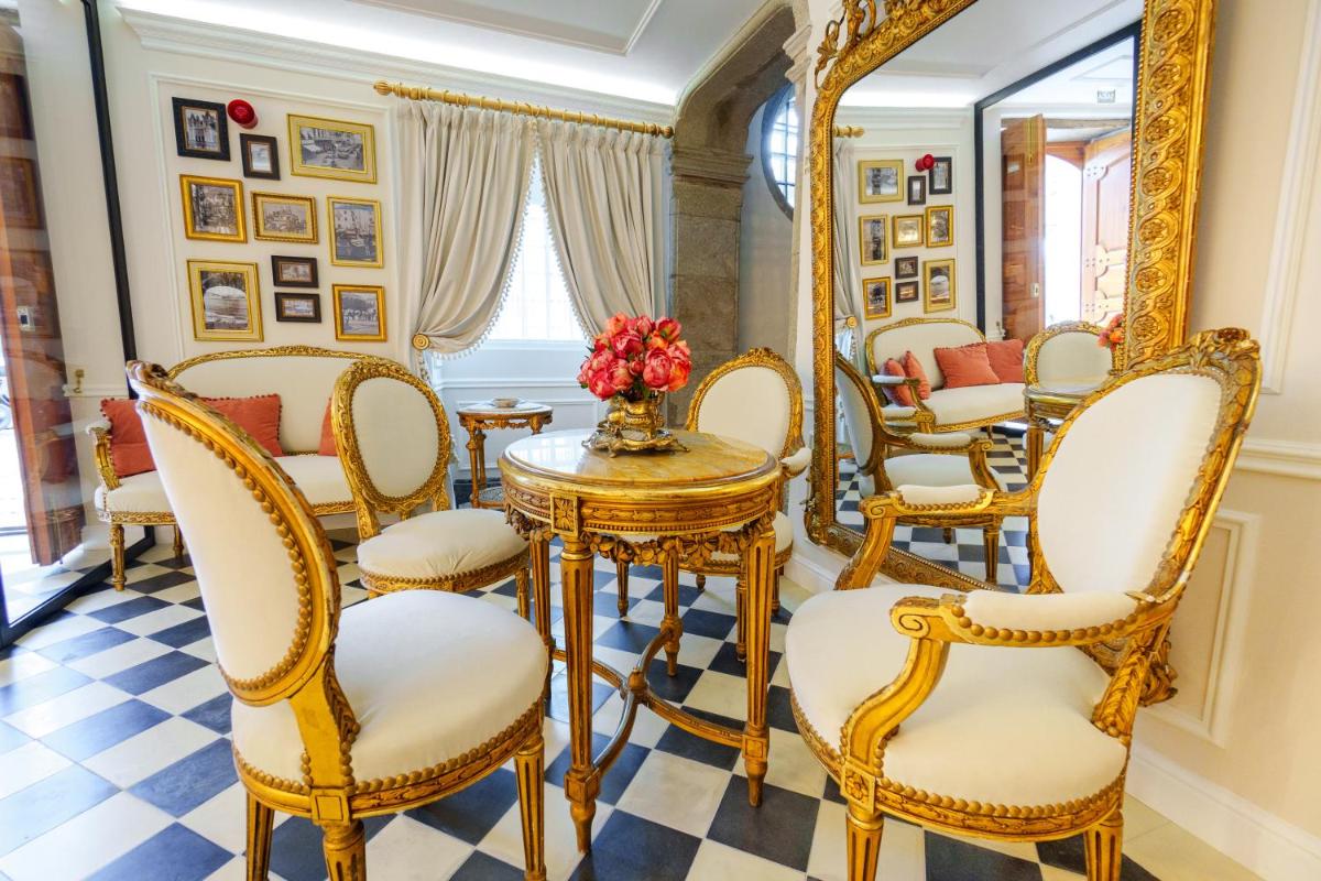 Uma área de estar em Boutique Hotel Teatro