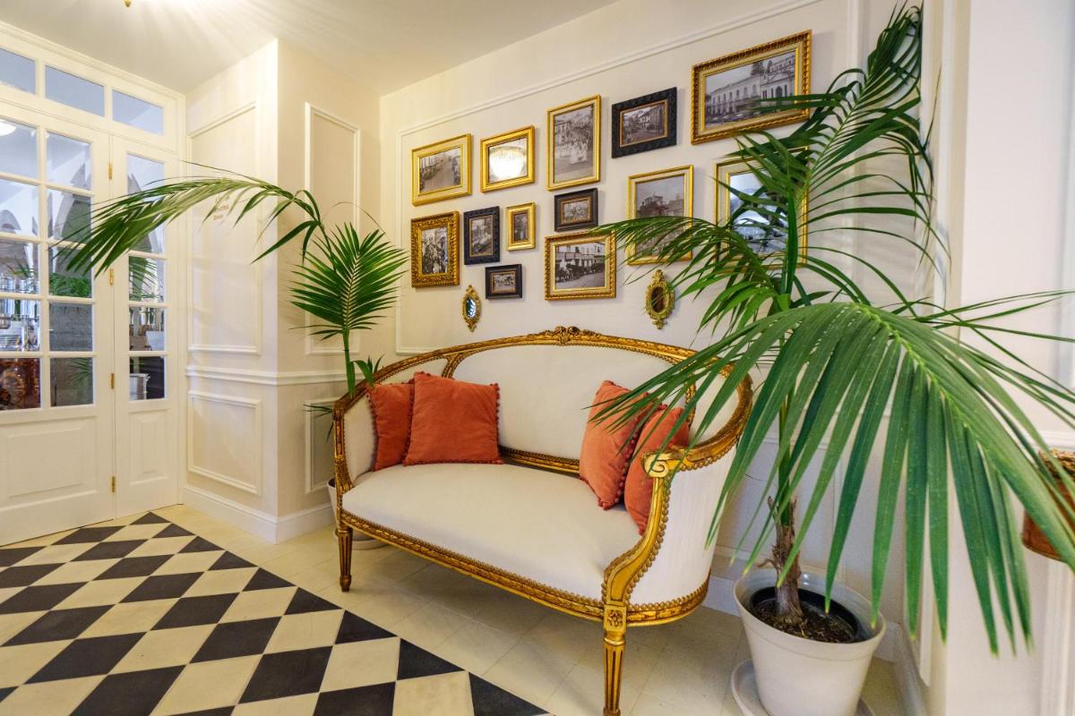 Uma área de estar em Boutique Hotel Teatro
