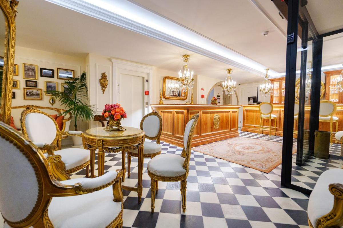 Uma área de estar em Boutique Hotel Teatro
