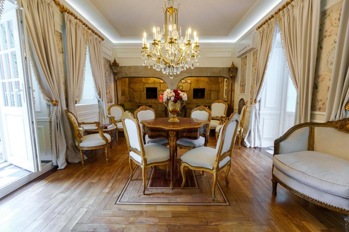Uma área de estar em Boutique Hotel Teatro