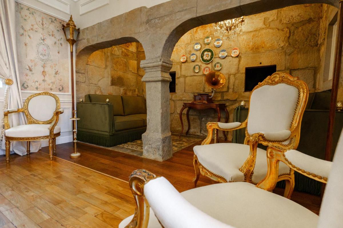 Uma área de estar em Boutique Hotel Teatro