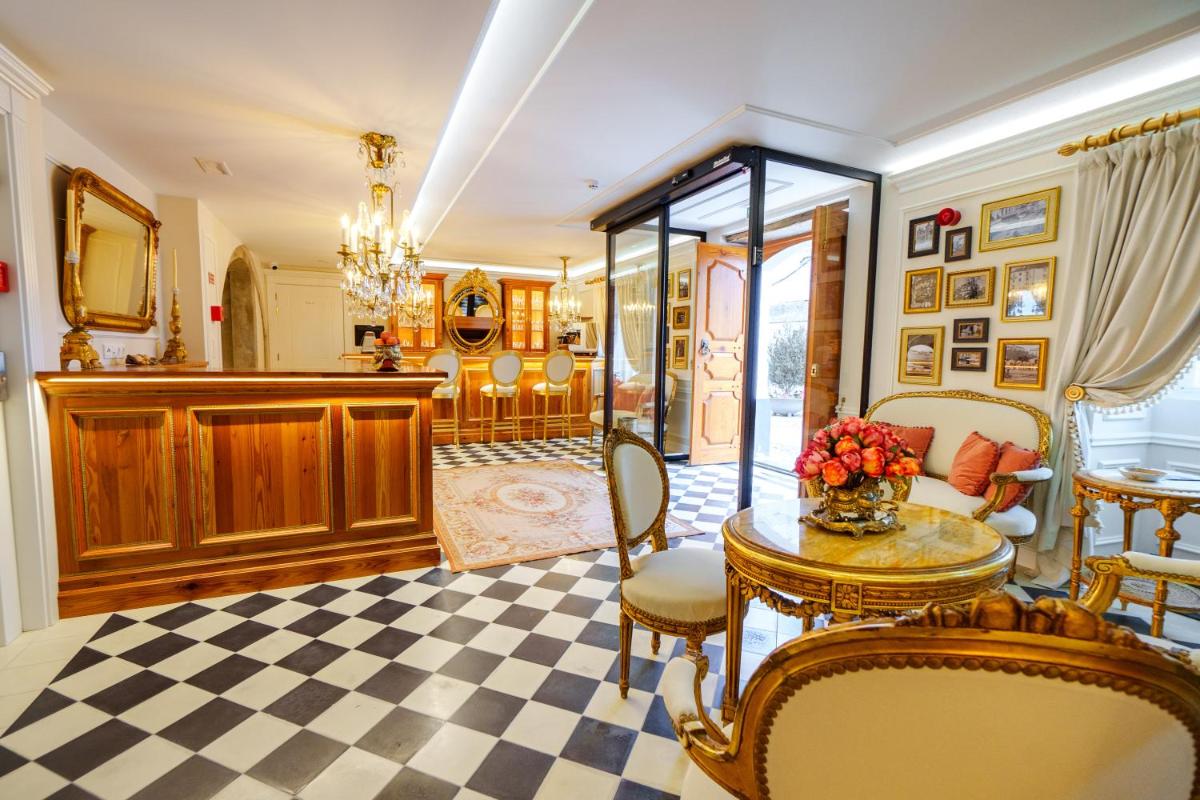 Uma área de estar em Boutique Hotel Teatro