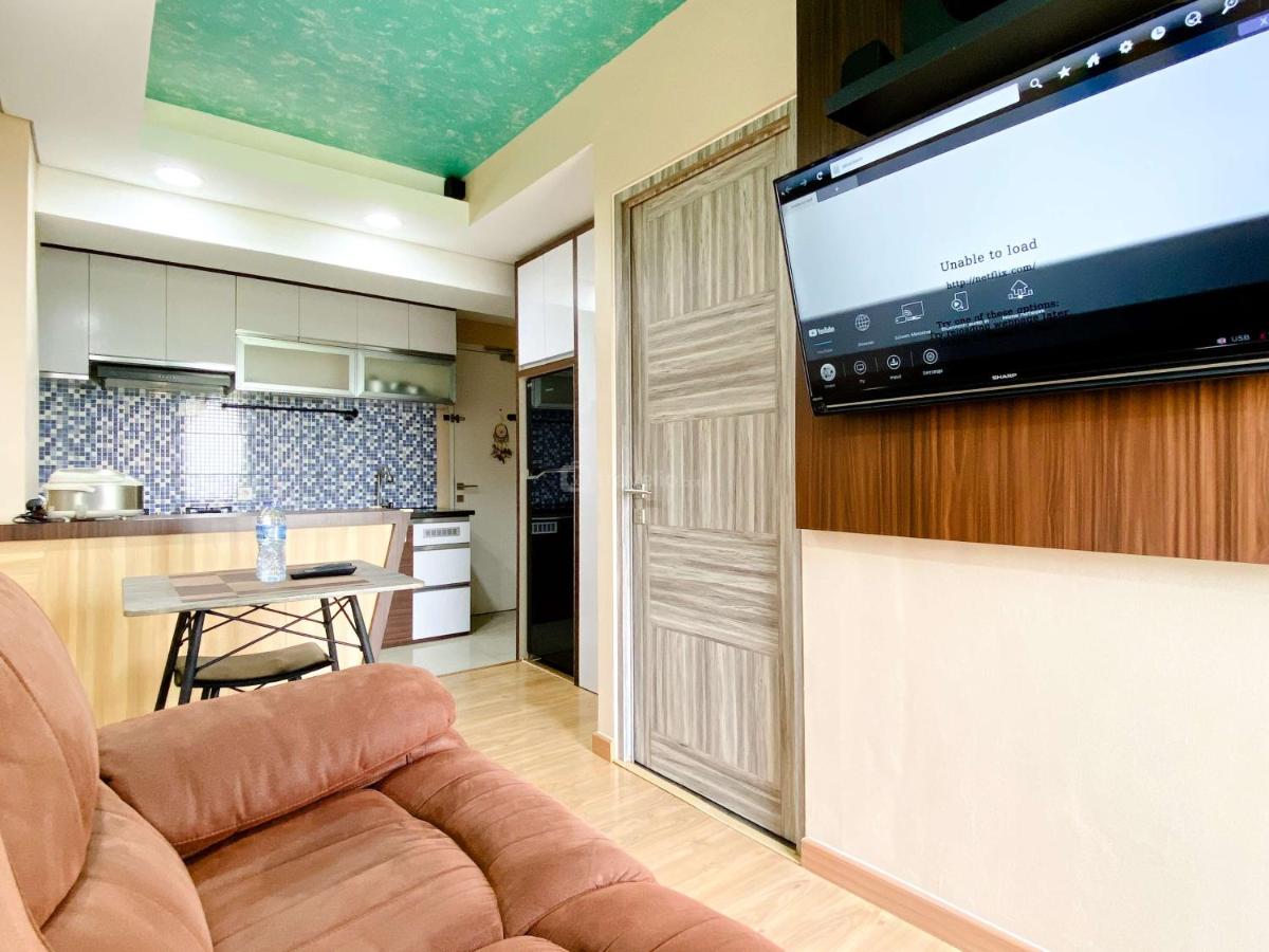 Best Deal and Homey 1BR Apartment Grand Sentraland Karawang By Travelio - Housity