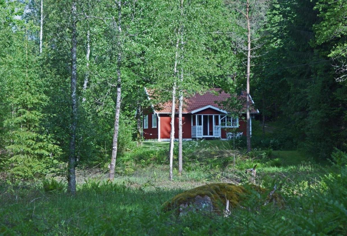 Gemütliches Holzhaus mit Boot - Housity