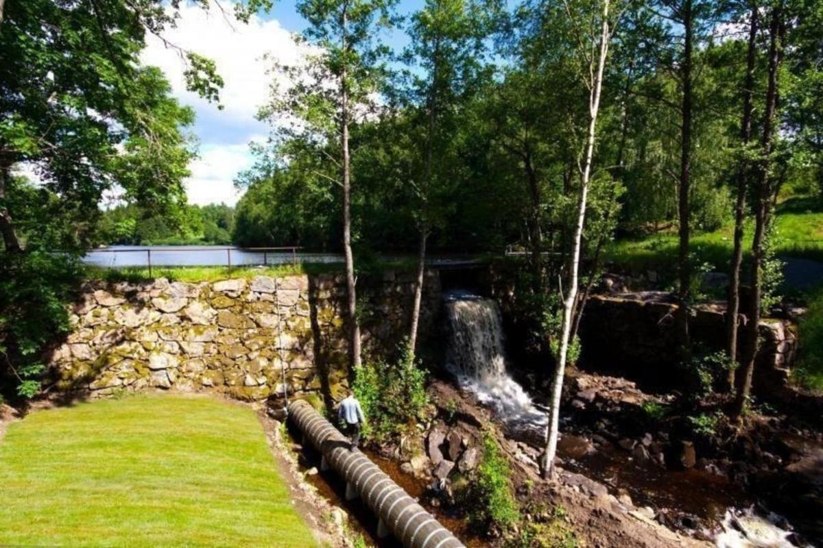 Direkt am See gelegenes Ferienhaus - Housity