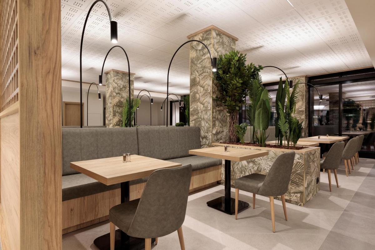 Zona de estar de Hotel Best Triton