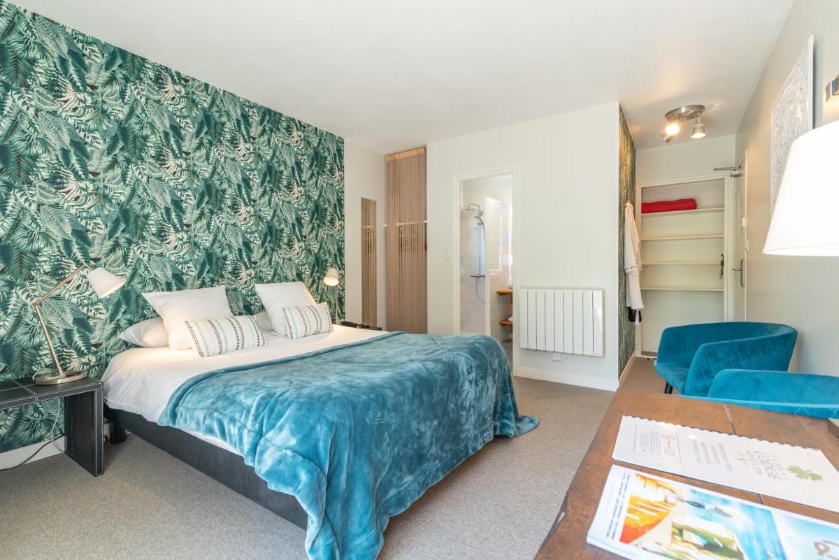 Un ou plusieurs lits dans un hébergement de l'établissement Carnac Lodge Hotel & Spa