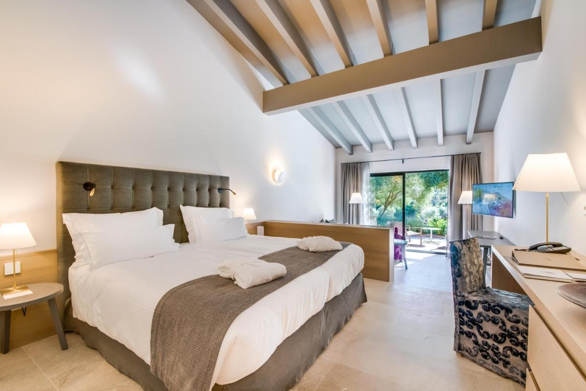 Cama o camas de una habitación en Carrossa Hotel & Spa