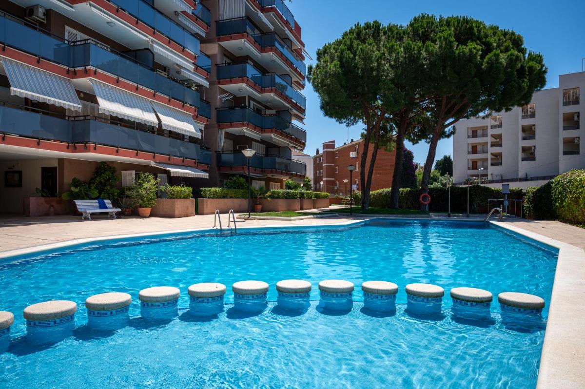 AT253 Planta baja con salida a la piscina, cerca de la playa La Paella - Housity