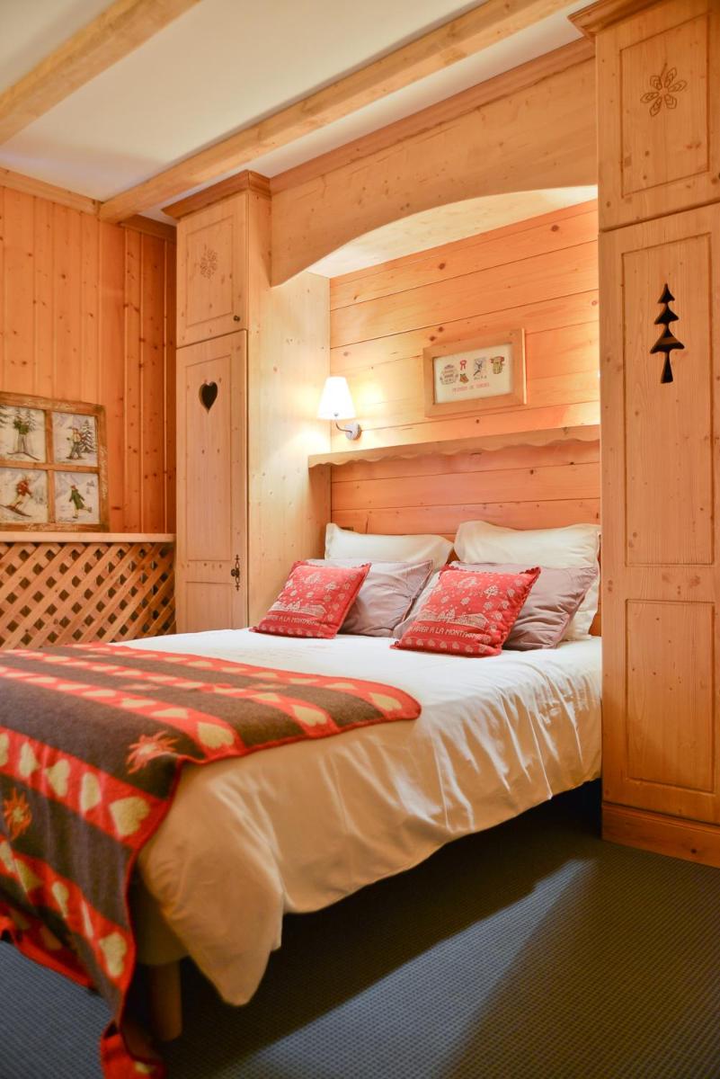 Un ou plusieurs lits dans un hébergement de l'établissement Café-Hôtel Le Morillon, Domaine du Grand Massif-Samoëns