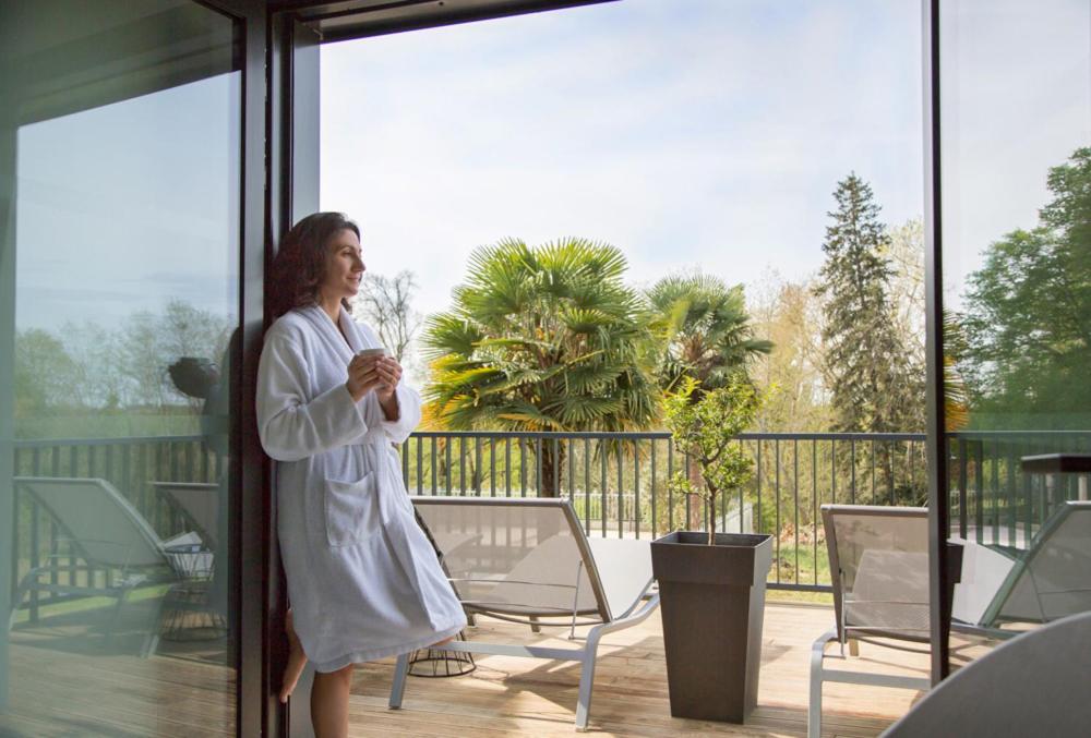 Balcon ou terrasse dans l'établissement Logis Hôtel Restaurant Château Bellevue