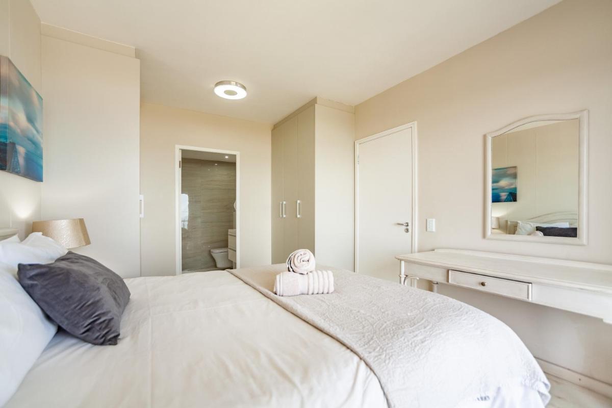 Luxury Private Beachfront 2 bedroom Dolphin Apartment, Blouberg, Cape Town - Housity