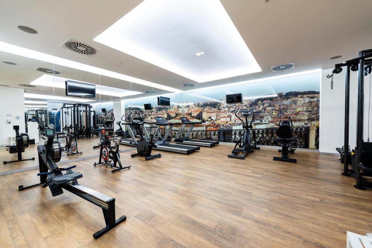 O centro de fitness e/ou as comodidades de fitness de Jupiter Lisboa Hotel - Rooftop & Spa