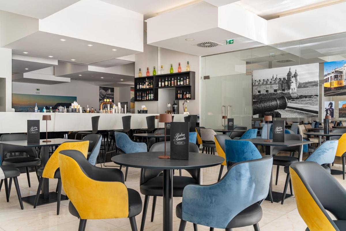 Um restaurante ou outro lugar para comer em Jupiter Lisboa Hotel - Rooftop & Spa