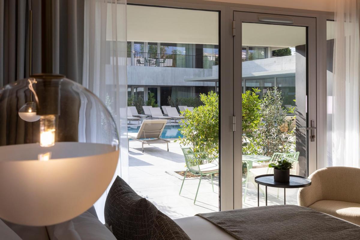 Coin salon dans l'établissement Hôtel Spa Restaurant Villa Castellane