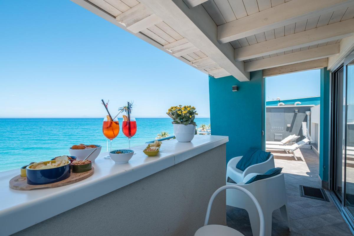 "I MORI LUXORY APARTMENTS" - Attico mansardato con incantevole vista mare - Housity