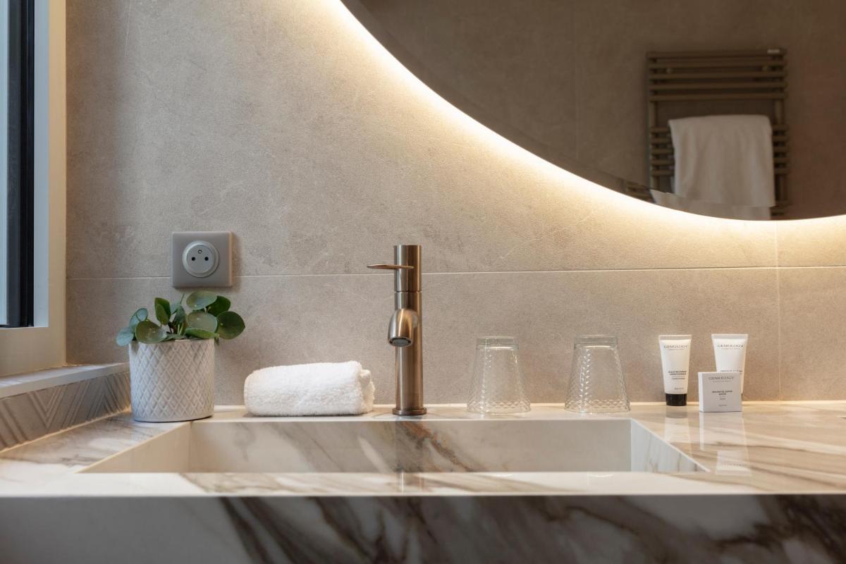 Salle de bains dans l'établissement Le Clos Alice