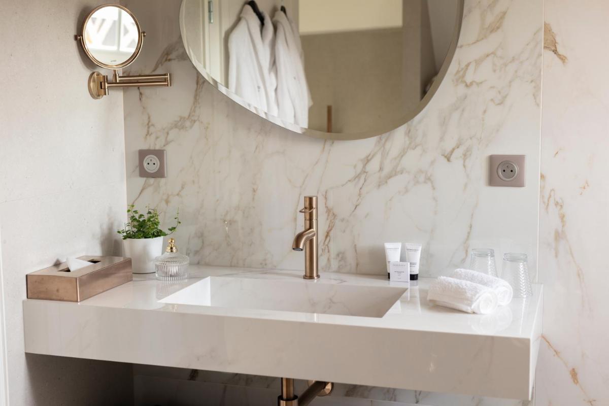 Salle de bains dans l'établissement Le Clos Alice