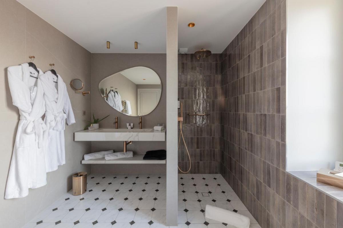 Salle de bains dans l'établissement Le Clos Alice