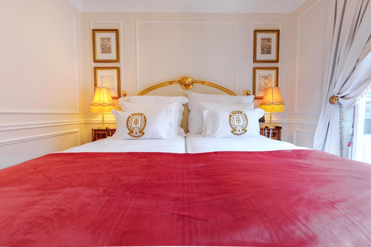 Uma cama ou camas num quarto em Boutique Hotel Teatro