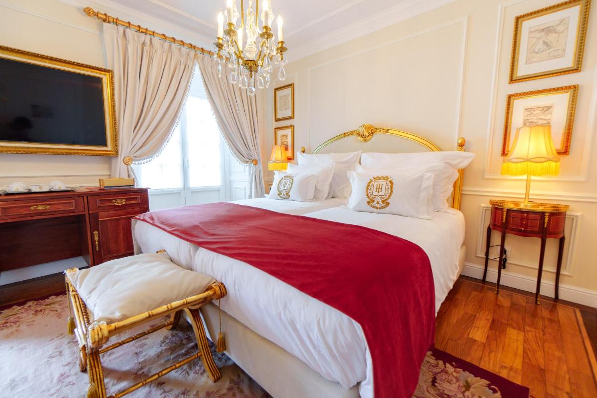 Uma cama ou camas num quarto em Boutique Hotel Teatro