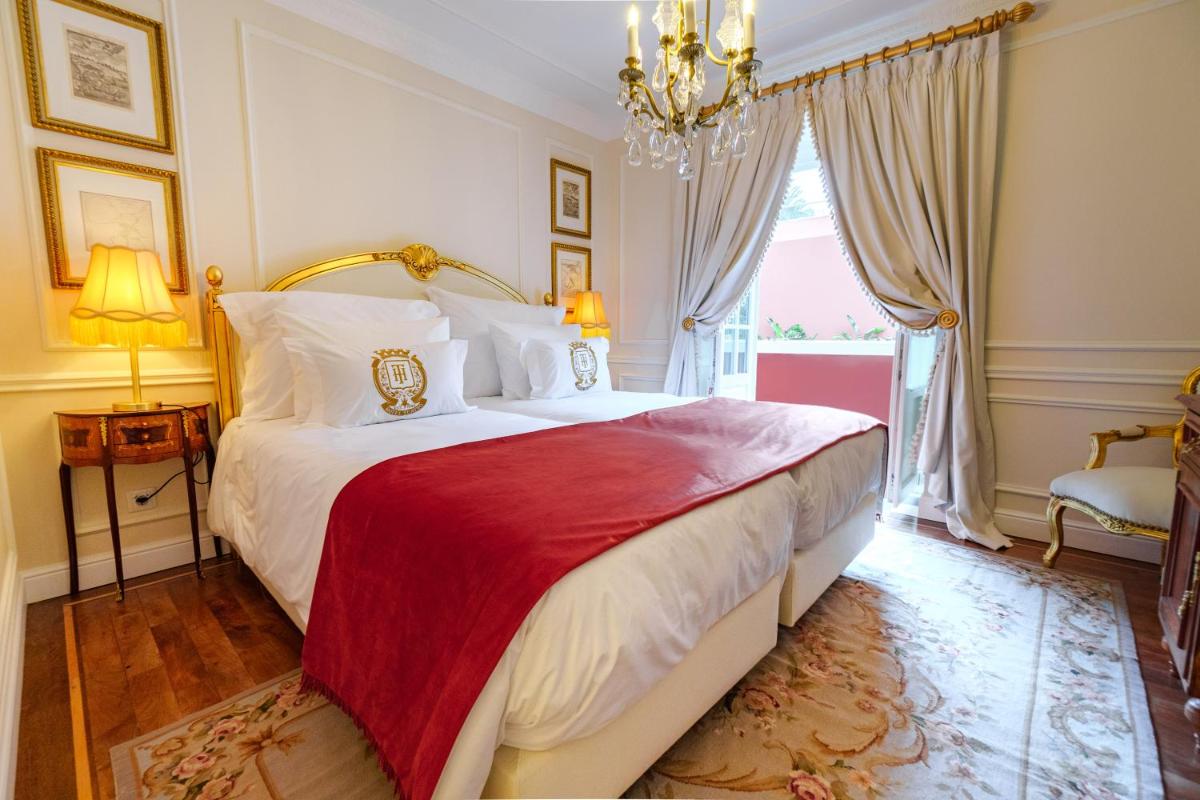 Uma cama ou camas num quarto em Boutique Hotel Teatro